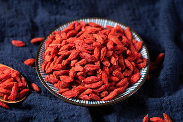 Dried Chinese wolfberries or Goji berry or Matrimony vine on table.