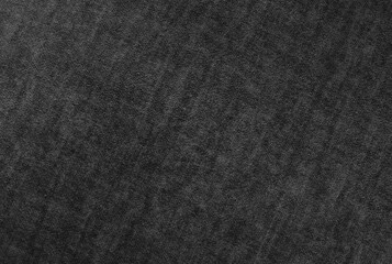 Texture background of velours black fabric.