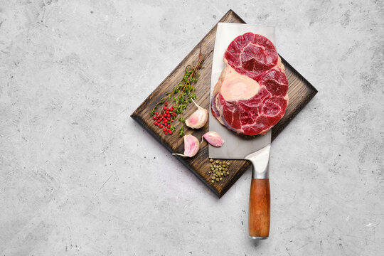 Top view of raw beef shank cross-cut on cleaver