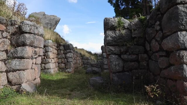 Scrutinizing the Regal View of Cusilluchayoc El Templo de Los Monos in Cusco District, Peru - Aerial Pan Left