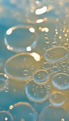 Closeup of bubbles in liquid water. Condensation. Gel globules. Circles in a water glass. Sunlight through a pool in summer