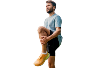 A man stretching his body outdoors taking care of his health.  Warm-up running for an active workout, a young guy is an athlete.