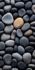 gray stone pebbles edge to edge background.