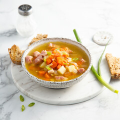 Traditional pea soup with ham and vegetables