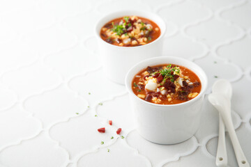 Cold tomato soup with ham and egg
