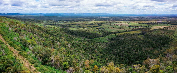 Fototapeta na wymiar Aerial view of farm land near Calliope with dam and farm, Queensland, Australia.