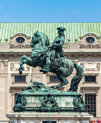 Obraz premium Statue of Prince Eugene on Heldenplatz square in front of Hofburg palace, Vienna, Austria