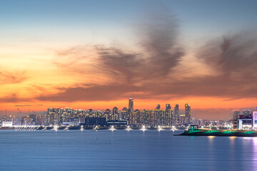 Fototapeta premium The evening scenery and sunset of the city from each other