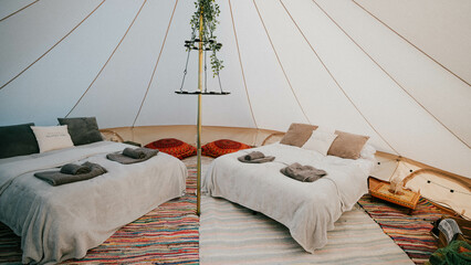 bed in a luxury camping tent