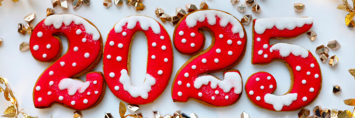 Christmas and New Year banner gingerbread cookies numbers 2025 on white background with copy space