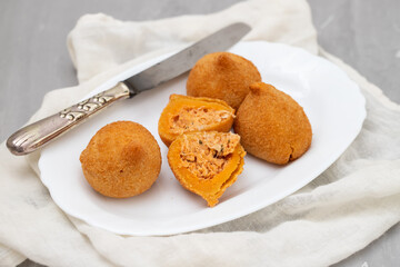 traditional fried coxinha on a plate