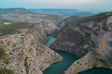 Fototapeta premium Grand canyon view. Blue stream flowing through the mountains. Denizli/Kale Incegiz Canyon