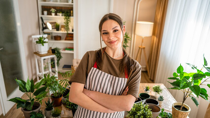 woman gardener florist portrait at home indoor happy female smile