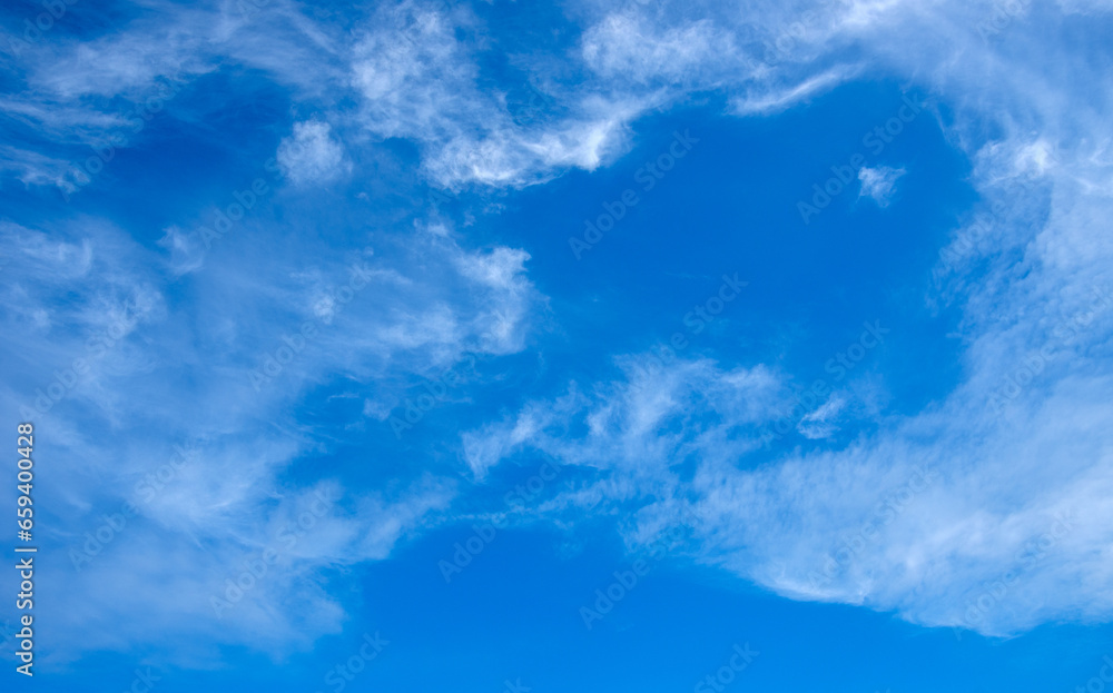 Wall mural White clouds in blue sky.