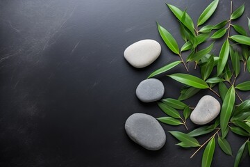 Obraz na płótnie Canvas A serene flat lay presenting hot stones and bamboo, exuding a calming and peaceful ambiance, with a considerate amount of empty space for versatile use in wellness and spa contexts.