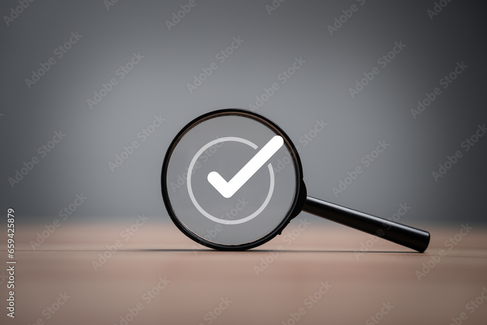 Poster white correct sign symbol inside black magnifier glass for document and project approve , iso qualit