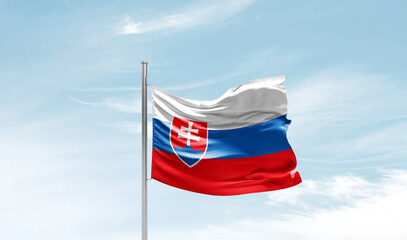 Slovakia national flag waving in beautiful sky. The symbol of the state on wavy silk fabric.