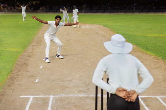 A bowler and the team appeals to umpire for out during a cricket match