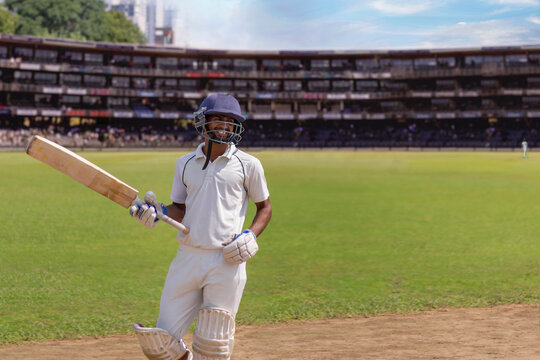 Batsman taking a run during a match
