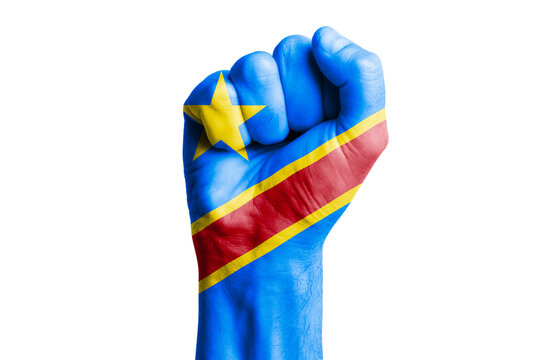 Man hand fist of CONGO DEMOCRATIC REPUBLIC flag painted. Close-up.