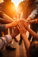 Lot of people hands united together in the air with sun light representing friendship and working together concept - obrazy, fototapety, plakaty