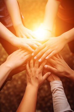 Lot Of People Hands United Together In The Air With Sun Light Representing Friendship And Working Together Concept