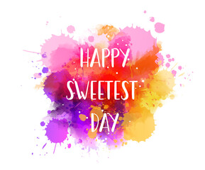 Happy sweetest day - handwritten modern calligraphy inspirational text on multicolored watercolor paint splash. Background with abstract dots decoration.