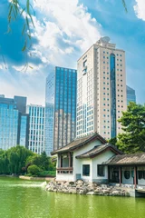 Zelfklevend Fotobehang Beijing Tuanjiehu Park and Central Business District Office Building © 拾海月