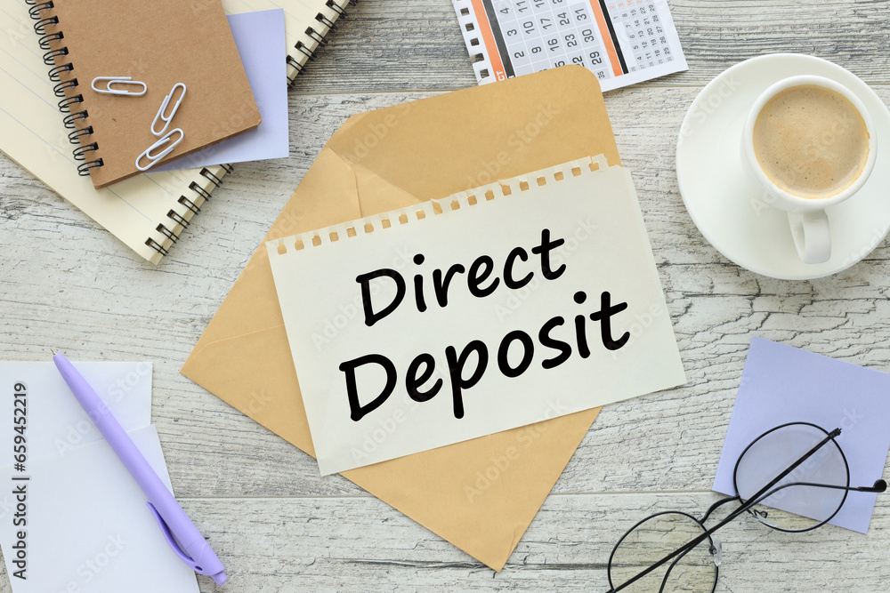 Poster direct deposit . business concept image. calendar on the table. paper with text on the envelope.