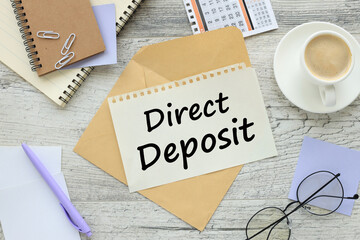 direct deposit . Business concept image. calendar on the table. paper with text on the envelope. - obrazy, fototapety, plakaty