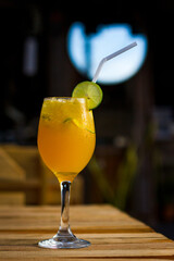 Iced lemon tea, a cooling drink placed on the table.