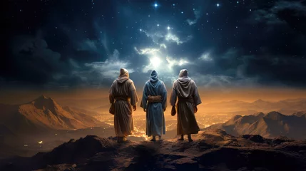 Fotobehang The Three Wise Men carry gifts through the desert guided by the stars. Christmas concept. © Alfonso Soler