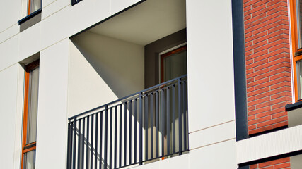 Brand new apartment building on sunny day. Modern residential architecture. Modern multi-family apartment house. 