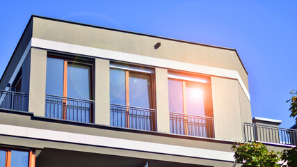 Brand new apartment building on sunny day. Modern residential architecture. Modern multi-family apartment house. 
