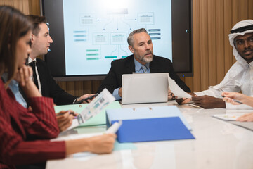 Businesspeople team partner meeting together to brainstorming for new ideas about business marketing project to partner working together planning success strategy enjoy teamwork in modern office