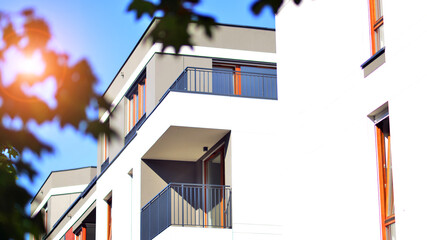 Green community. Eco apartment building saving energy and fresh air concept. Block of flats in beautiful green public