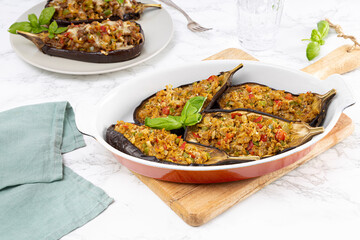 Eggplant stuffed with vegetables and seitan. Vegan and vegetarian food.