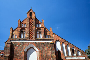 fragment of the facade of a medieval Gothic church in Poznan