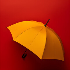 Yellow umbrella isolated on red background, copy space