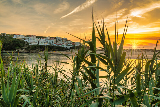 Small village at Praia Odeceixe on the west coast in Portugal at sunset