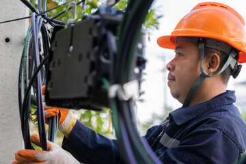 Technician are checking fiber optic cable for maintenance...