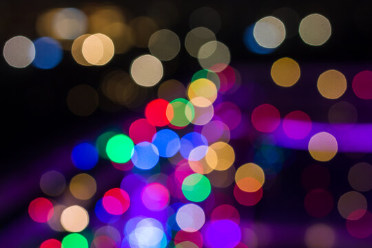 Out of focus colorful Diwali lights make festive background for Diwali,Christmas holiday concept.Selective focus,bokeh,blur with dark  background.Abstract wallpaper for Deepavali festival,India