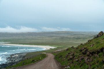 The long gravel road leading from Latrabjarg, Iceland for the famous bird cliffs
