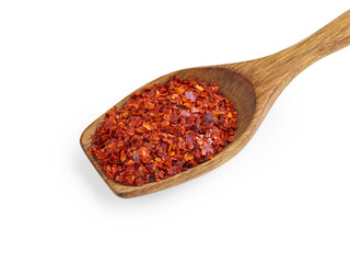 Crushed red pepper in wooden spoon isolated on white background