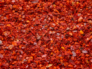 Crushed red pepper heap texture background