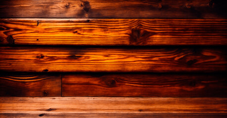 Empty wooden tabletop against an old wooden wall for product display. Banner format.