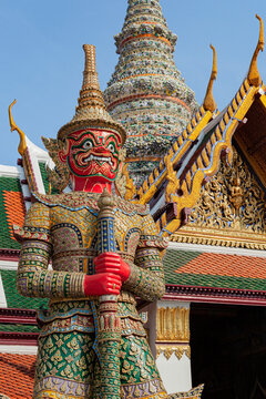 A close up view of a demon guard statue at the Grand Palace in Bangkok, Thailand.