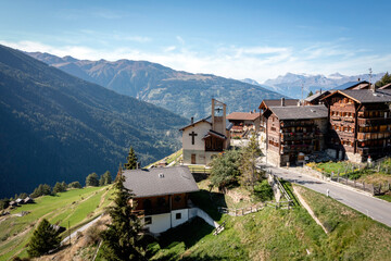 Fototapeta na wymiar drone view of old traditional village in the mountains of Val d'Herens in the Swiss Alps