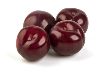 Isolated plums. One and a half of red plum fruit, isolated on white background.