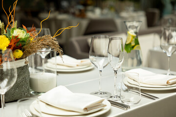 served table with empty dishes in a restaurant